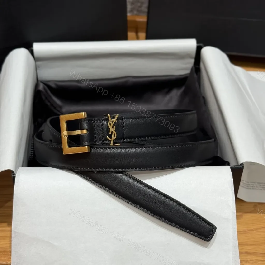 Elegant Black Leather Belt with Gold Hardware Belts: Luxury, Subtle Logo — view 1