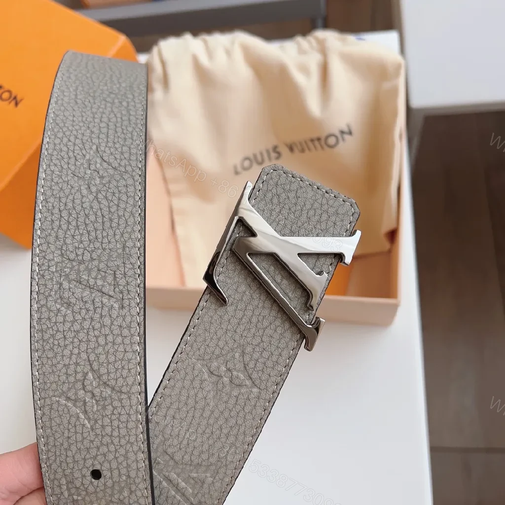 View 8 of Lux textured belt with signature metal buckle, premium leather