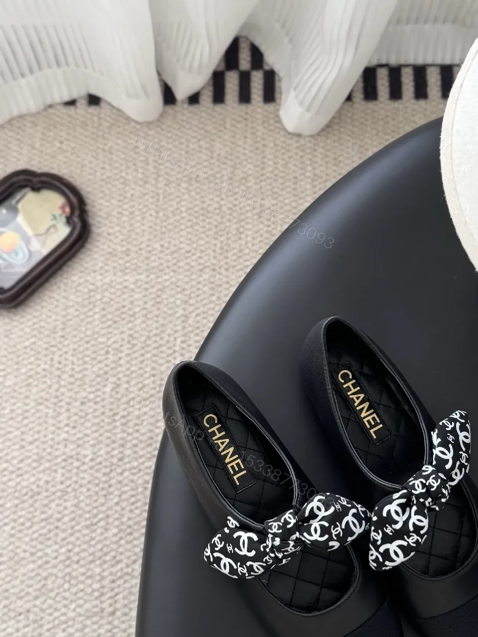 View 5 of Black Quilted Ballet Flats with Logo Bow - Chic, Comfortable Flats