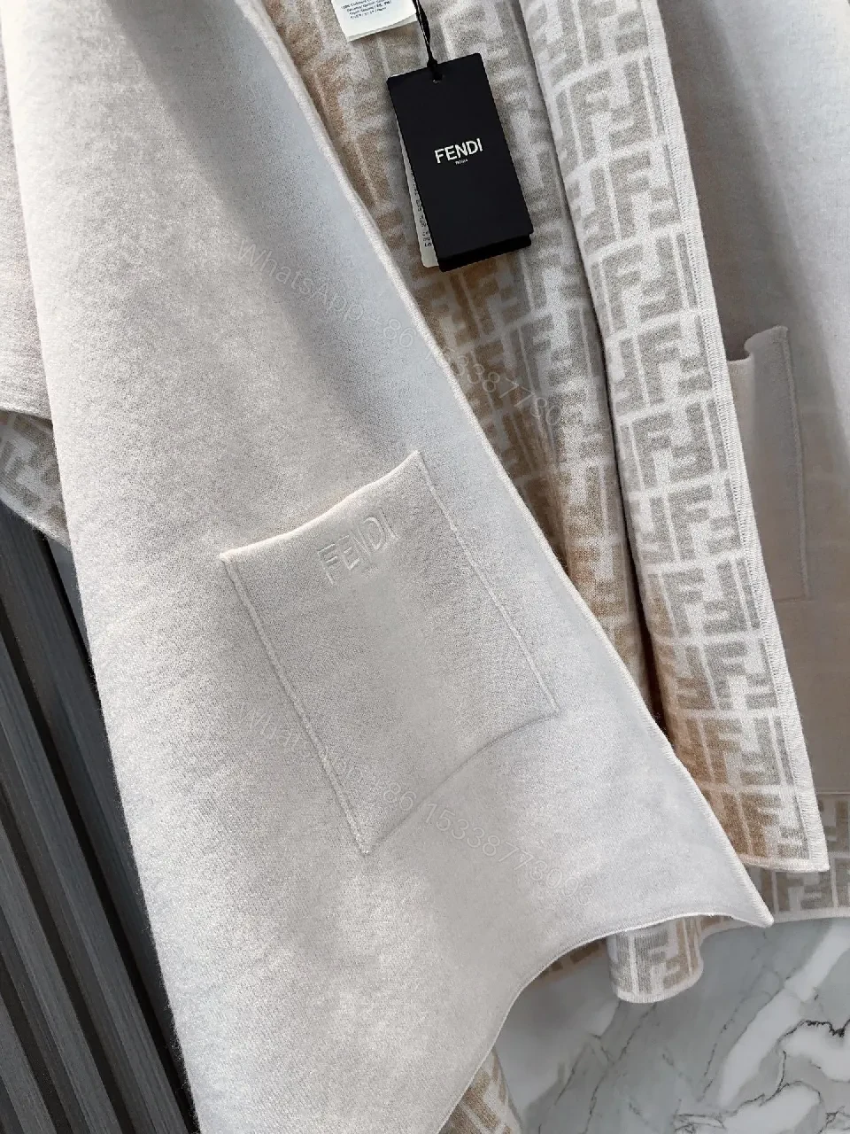 View 7 of Soft-Neutral Knit Cape Jacket: Luxury Comfort & Signature Trim