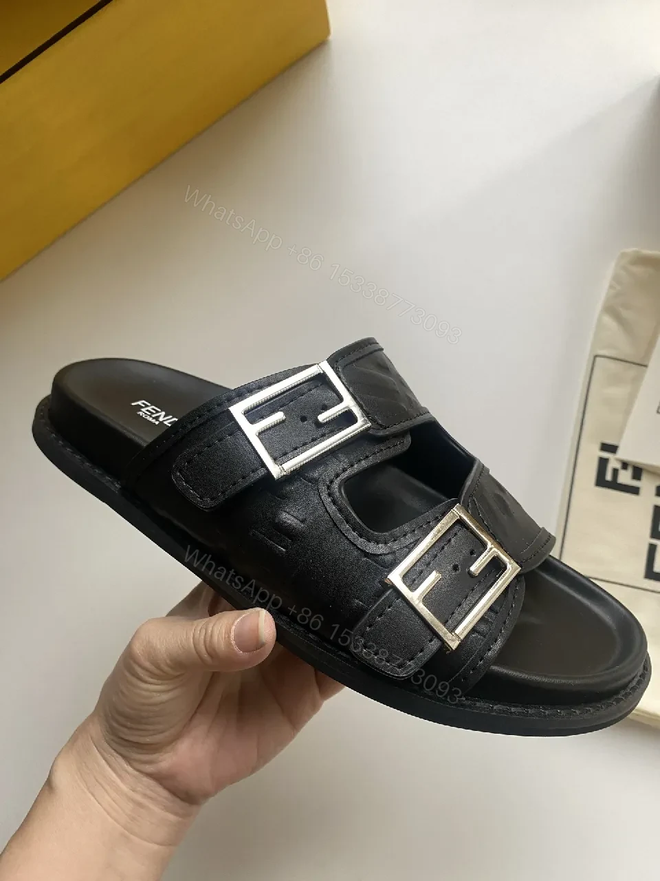 View 5 of Bold Leather Slides with Signature Detailing – Everyday Opulence