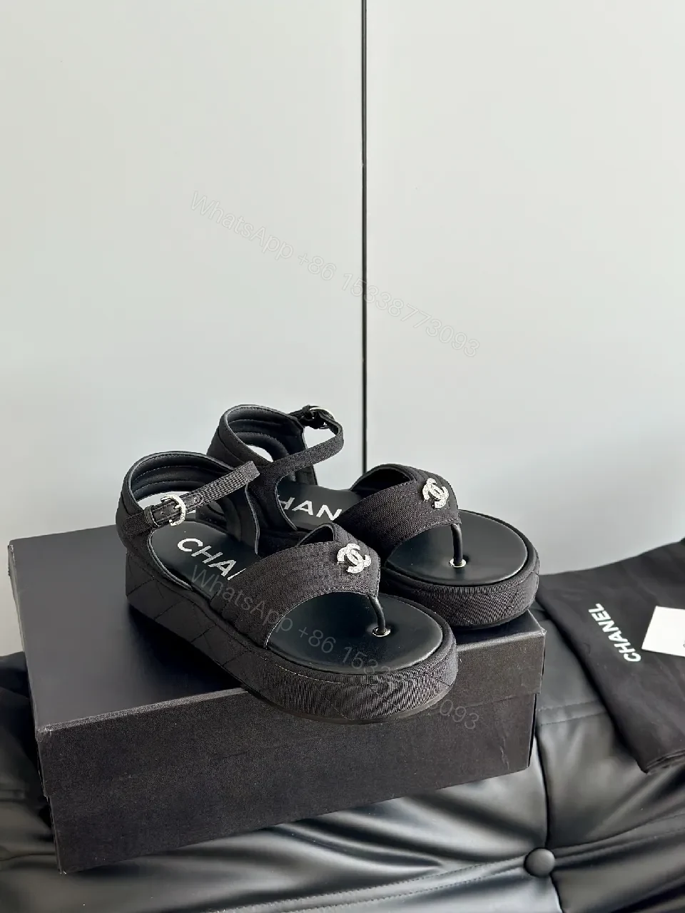 View 4 of Lux Black Sandals • Textured Upper • Logo Strap Luxe Comfort