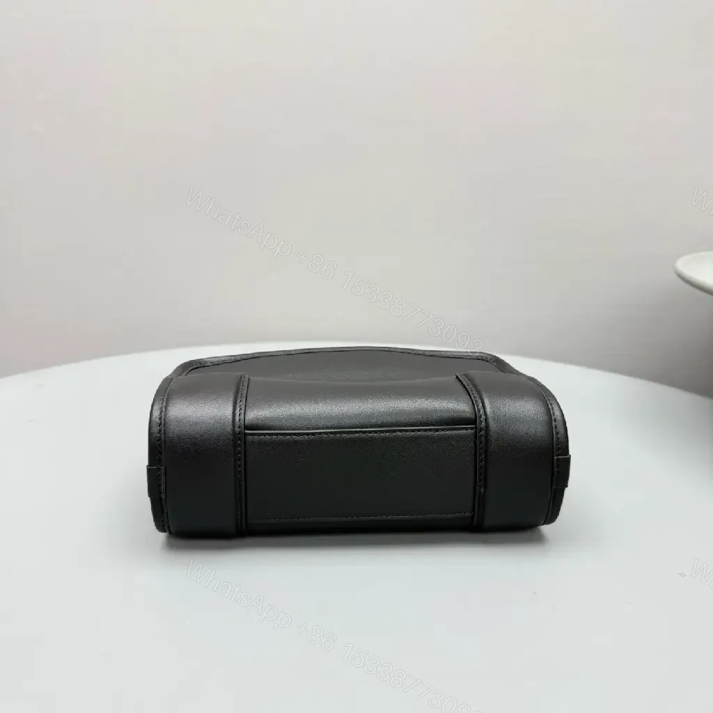View 7 of Structured Black Leather Mini Bag | Compact, Versatile Carryall