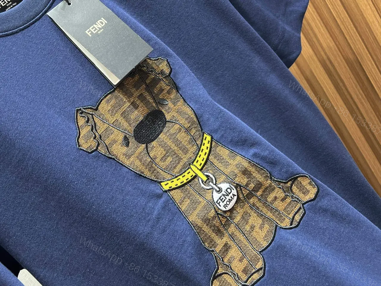 View 10 of Minimalist White Tee: Textured Bear Graphic, Designer-Influenced Luxury Tee