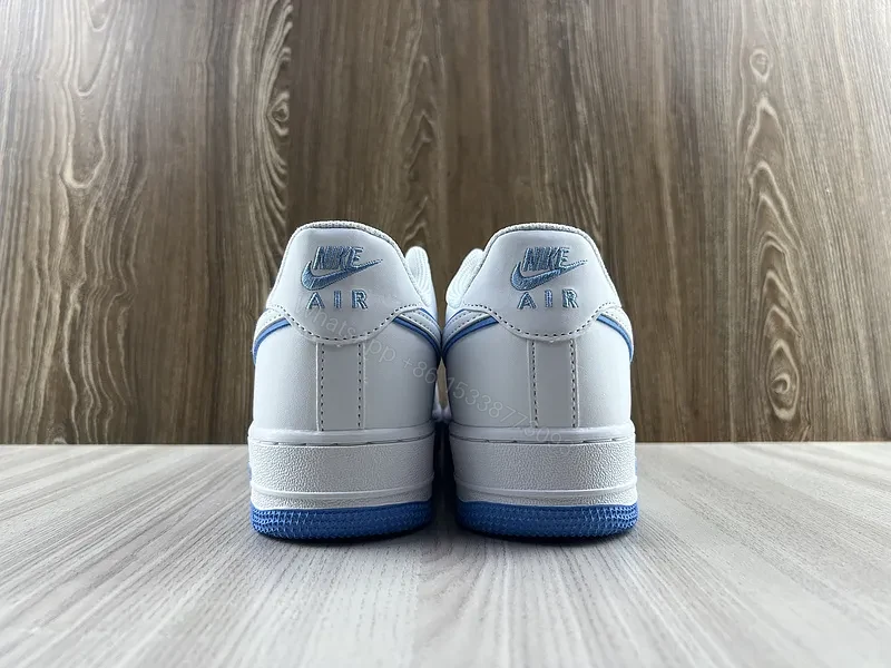 View 4 of White & Blue Minimalist Leather Sneaker â€“ Low-Top Comfort