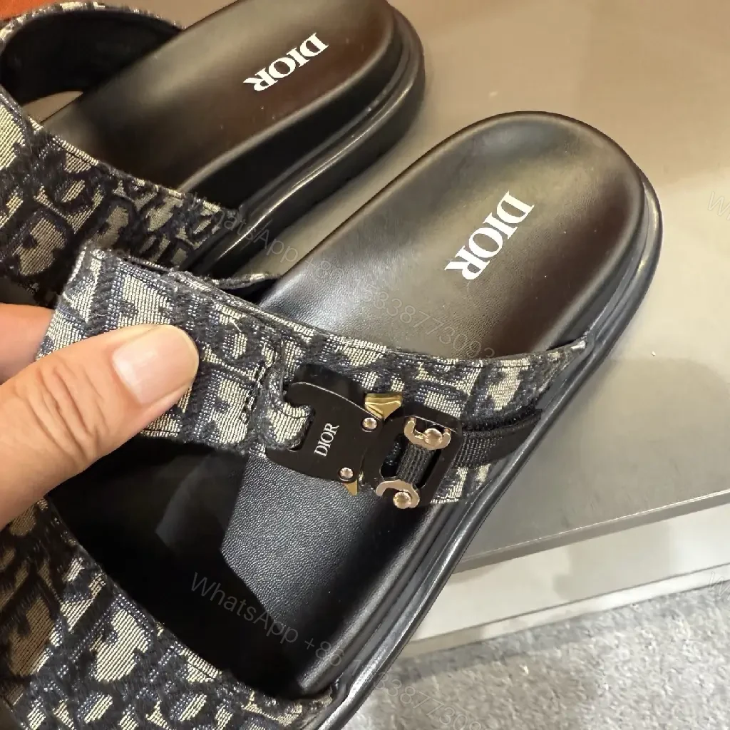 View 9 of Monochrome Monogram Slides: Sleek Signature Details