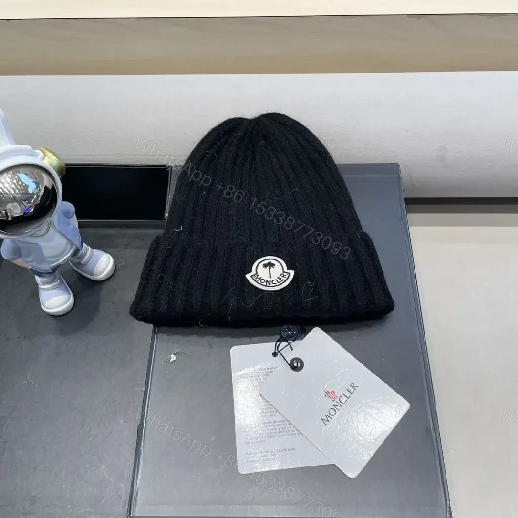 Cozy Black Knit Beanie with Signature Patch, Luxury Style — view 1