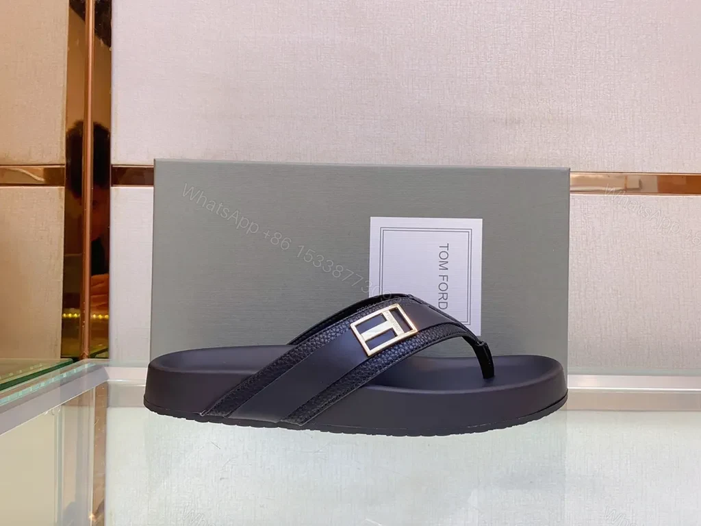 View 4 of Sleek Black Leather Sandal with Gold Buckle - All-Day Comfort