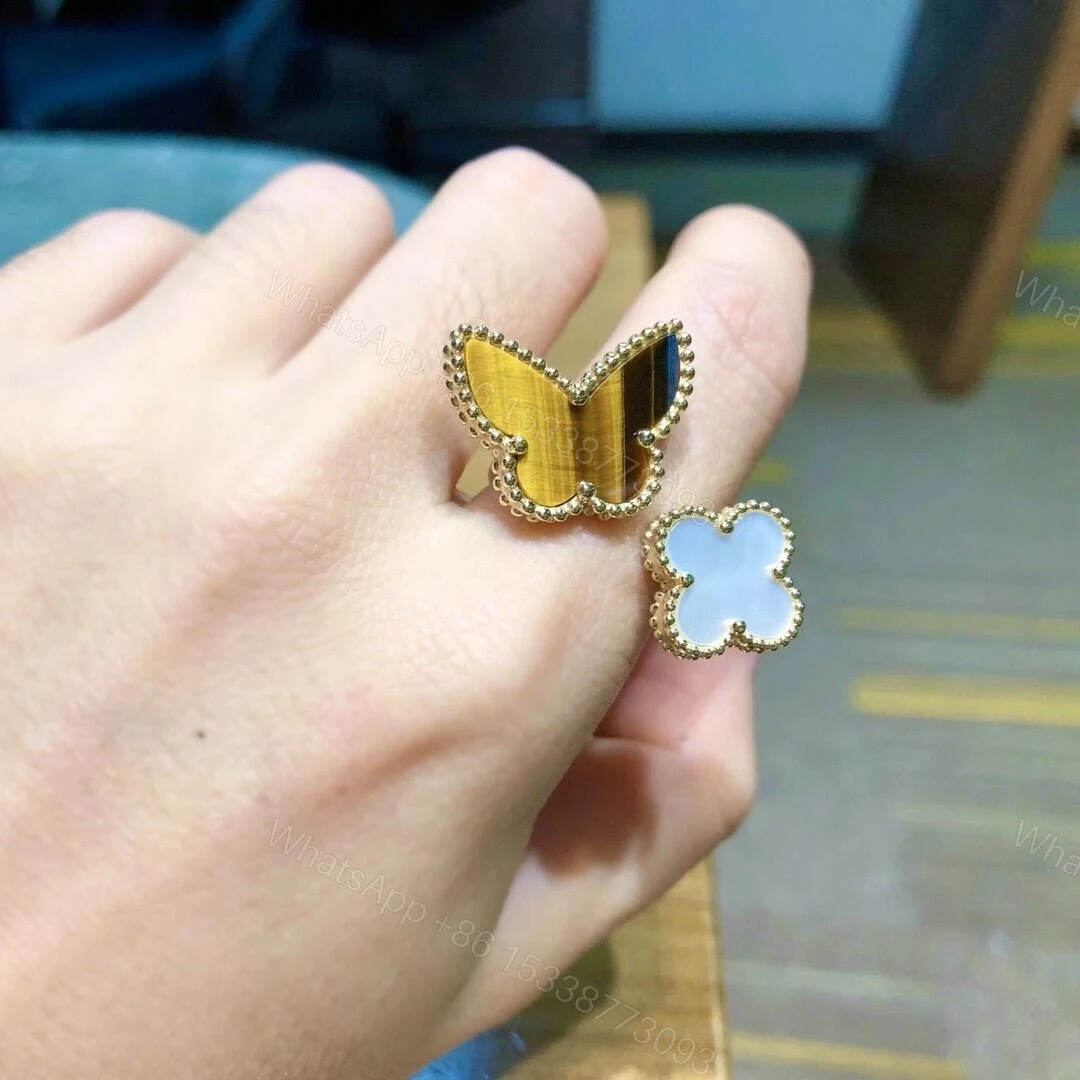 View 2 of Van Cleef & Arpels 18K Gold Lucky Alhambra Between The Finger Ring Butterfly Tiger Eyes VCARN05800