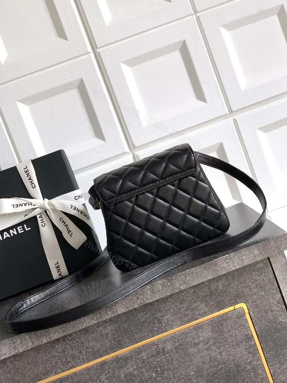 View 7 of Compact Quilted Black Camera Bag with Gold Hardware