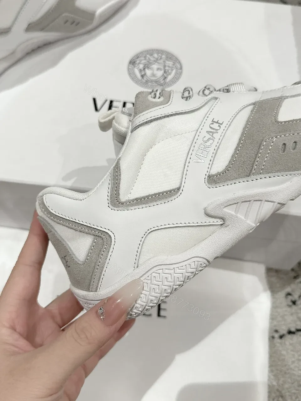 View 2 of Chunky White Trainer with Subtle Graphite Accents: Everyday Luxury Sneaker