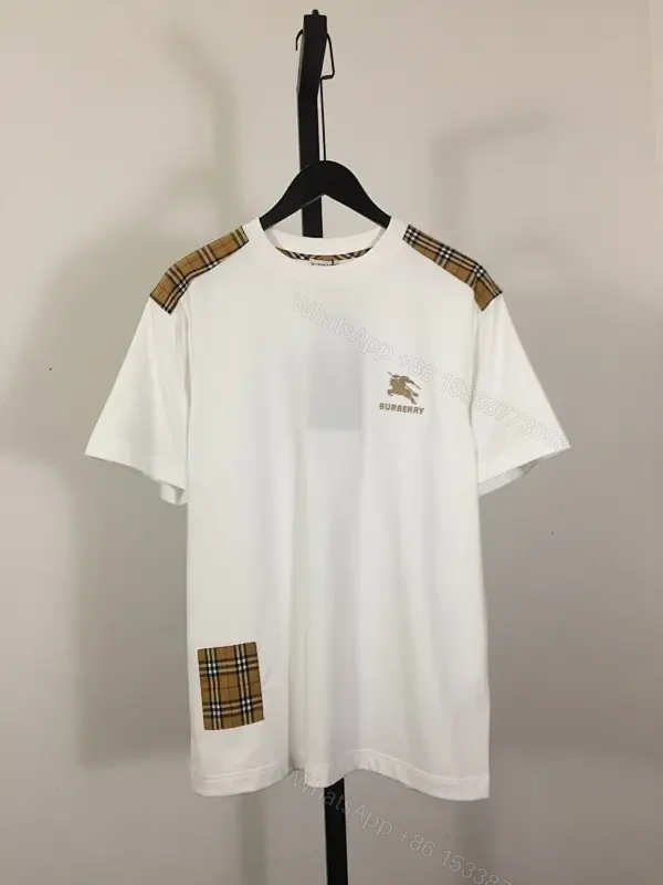 Casual Luxe Tee: White Cotton with Plaid Shoulder Accents — view 1