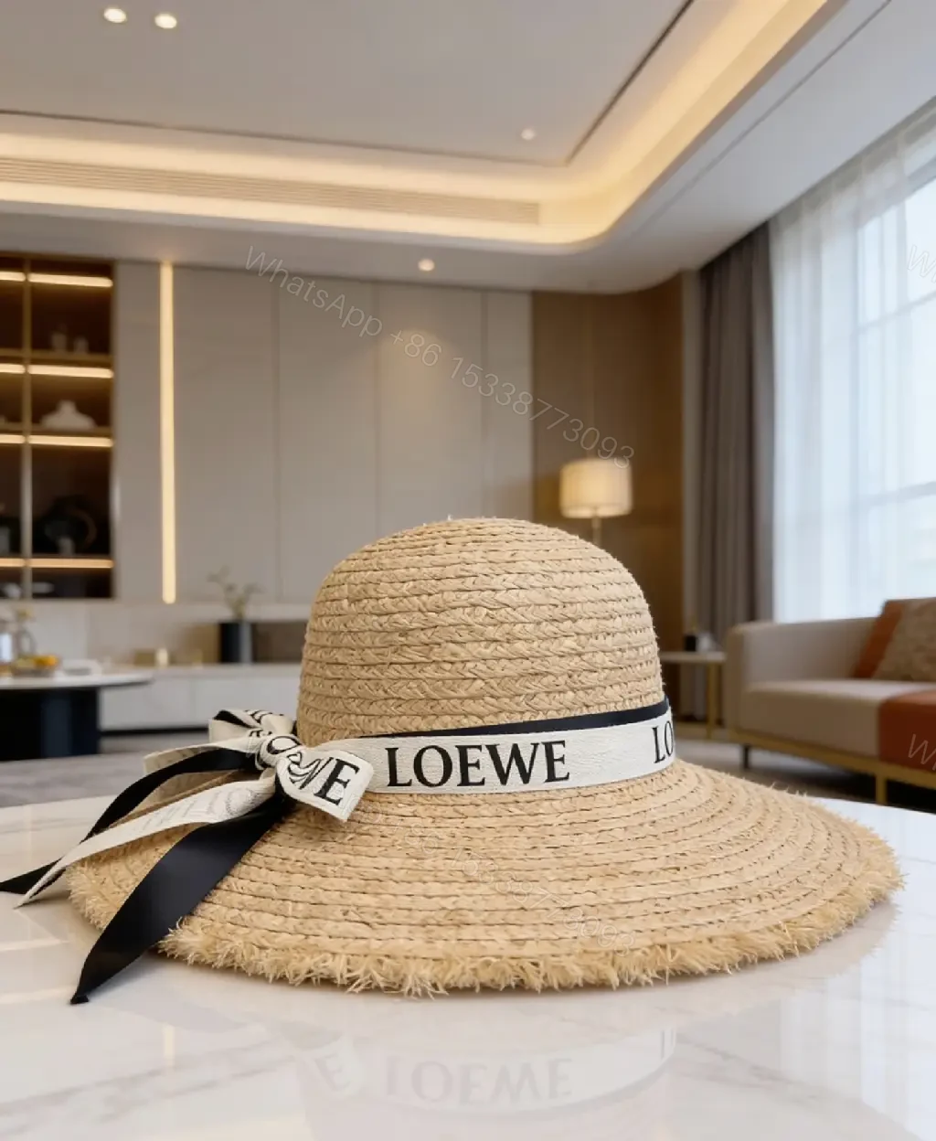 View 2 of Light Beige Straw Boater Hat with Ribbon Bow - LOEWE Style