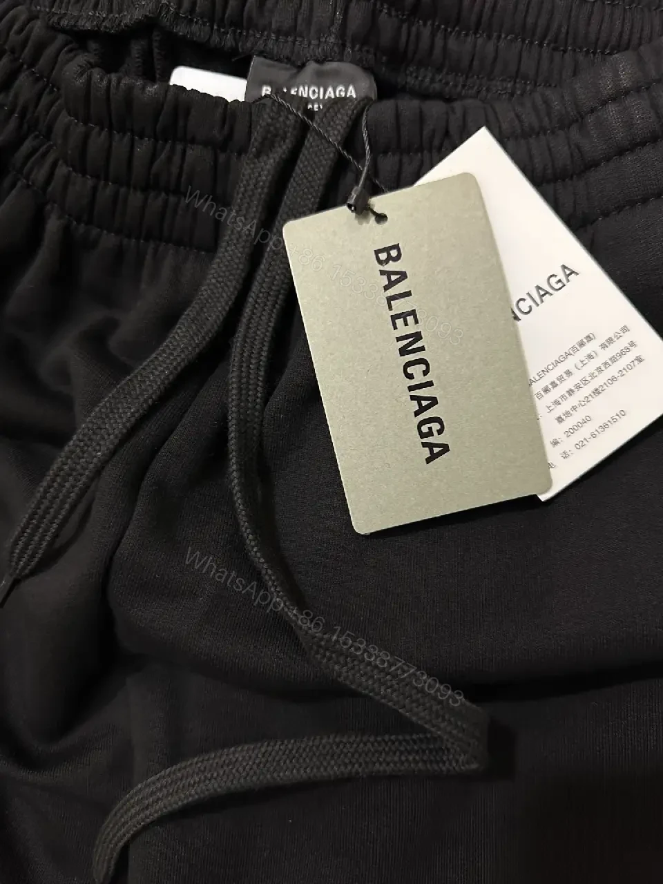 View 11 of black nylon shorts with logo motif for luxury everyday wear