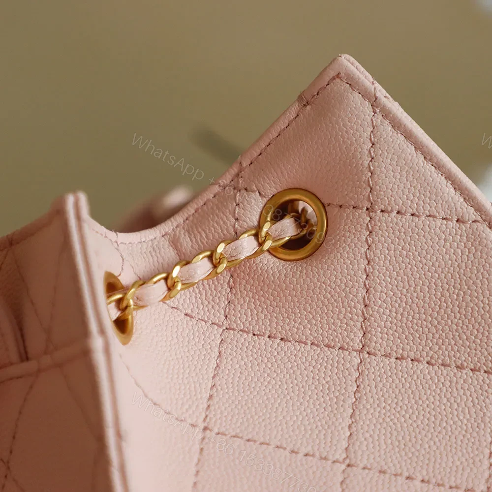View 3 of Soft Pink Quilted Bucket Bag with Gold Charm, Faux-Leather Bag