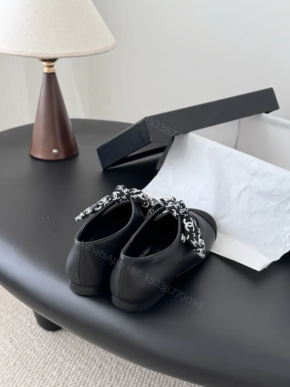View 7 of Black Quilted Ballet Flats with Logo Bow - Chic, Comfortable Flats