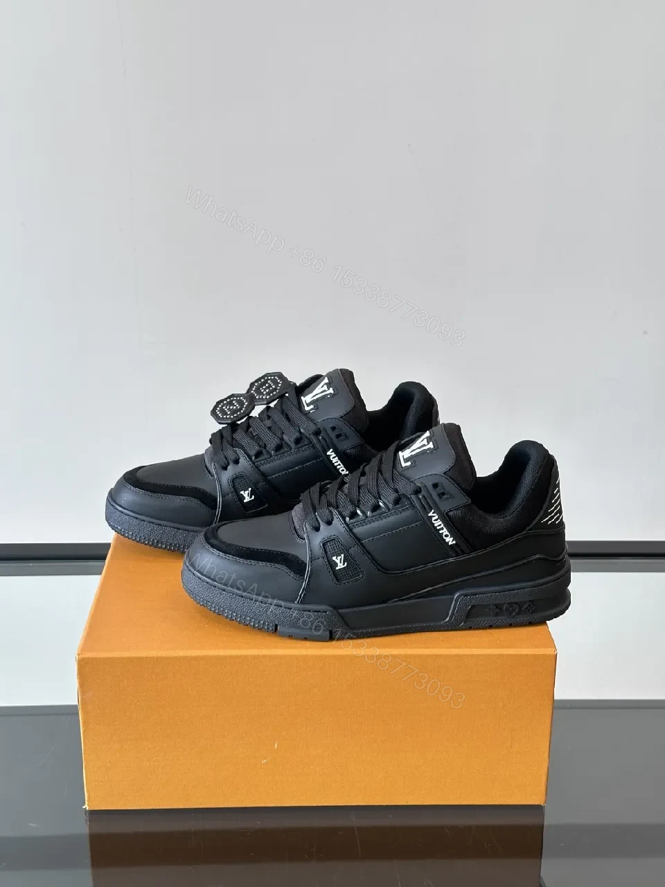 View 6 of Minimalist Black Leather Sneakers: Subtle Luxe Detailing High-Top