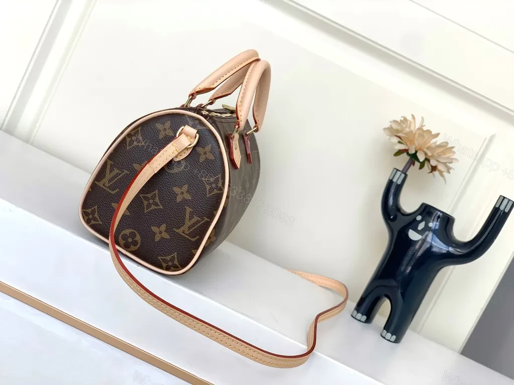 View 3 of Louis Monogram Carry: City-Ready Leather-Trim Handbag