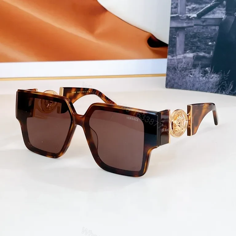 View 2 of Bold Oversized Sunglasses with Gold Accents: Statement Layer
