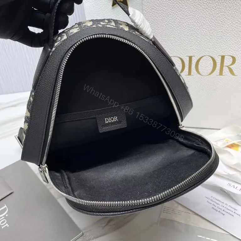 View 5 of Monogram Dior Backpack: Oblique Canvas, Black Leather, Luxe Daily Carry