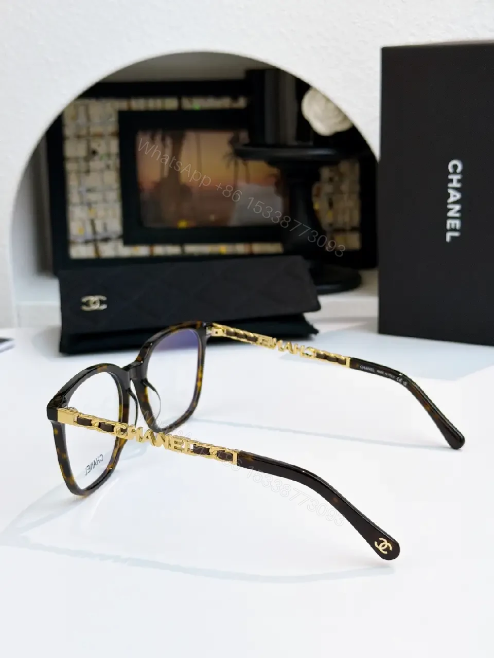 View 8 of Clear Translucent Frame Modern Oversized Sunglasses with CHANEL Accents