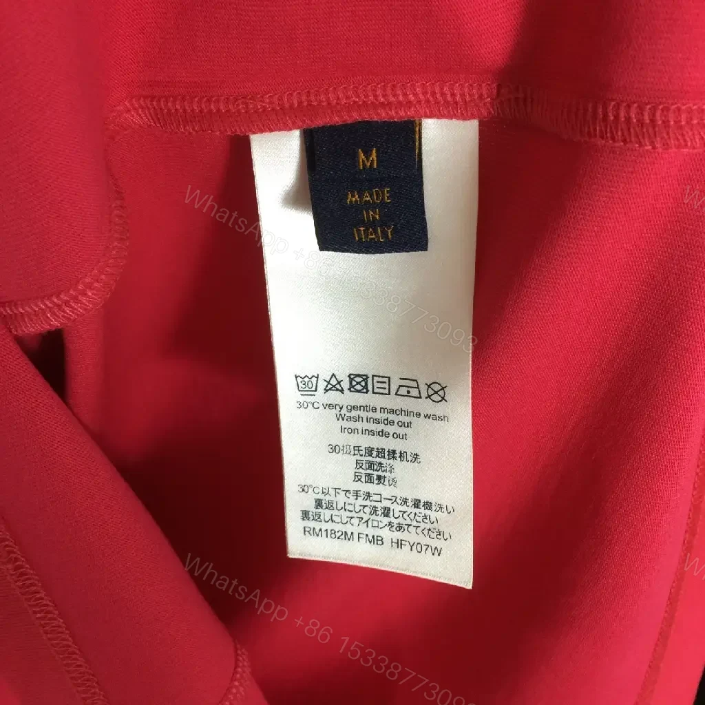 View 3 of Pink Monogram-Accent Cotton Tee: Luxe Streetwear, All-Day Comfort
