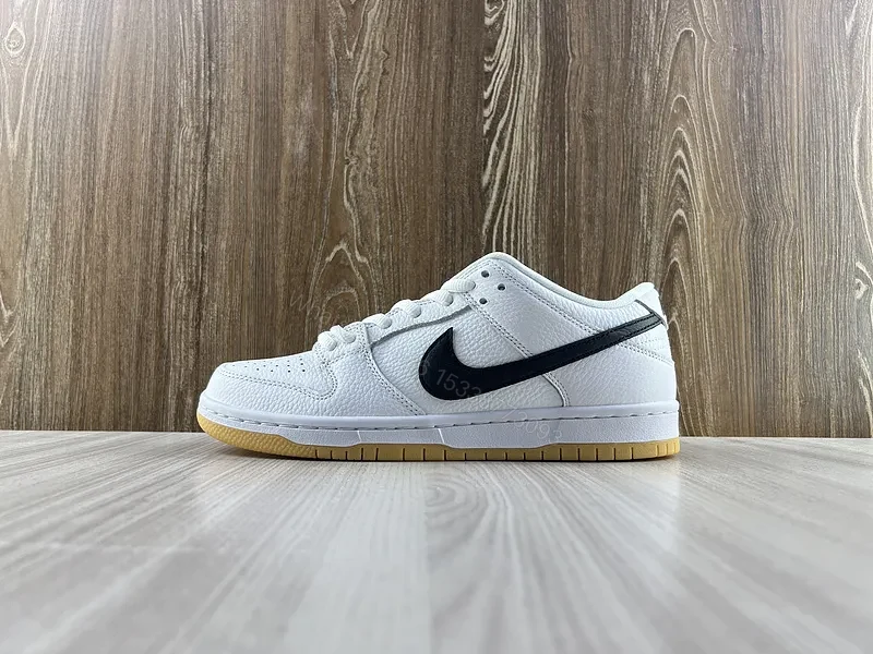 Minimal White & Black Nike-Style Sneaker with Gum Sole — view 1