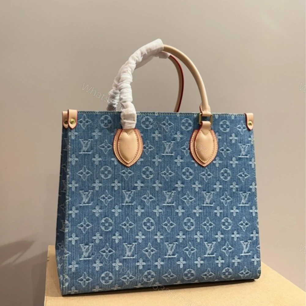 View 2 of Louis Vuitton New LV Remix Onthego MM Denim Blue 35Cm M46871