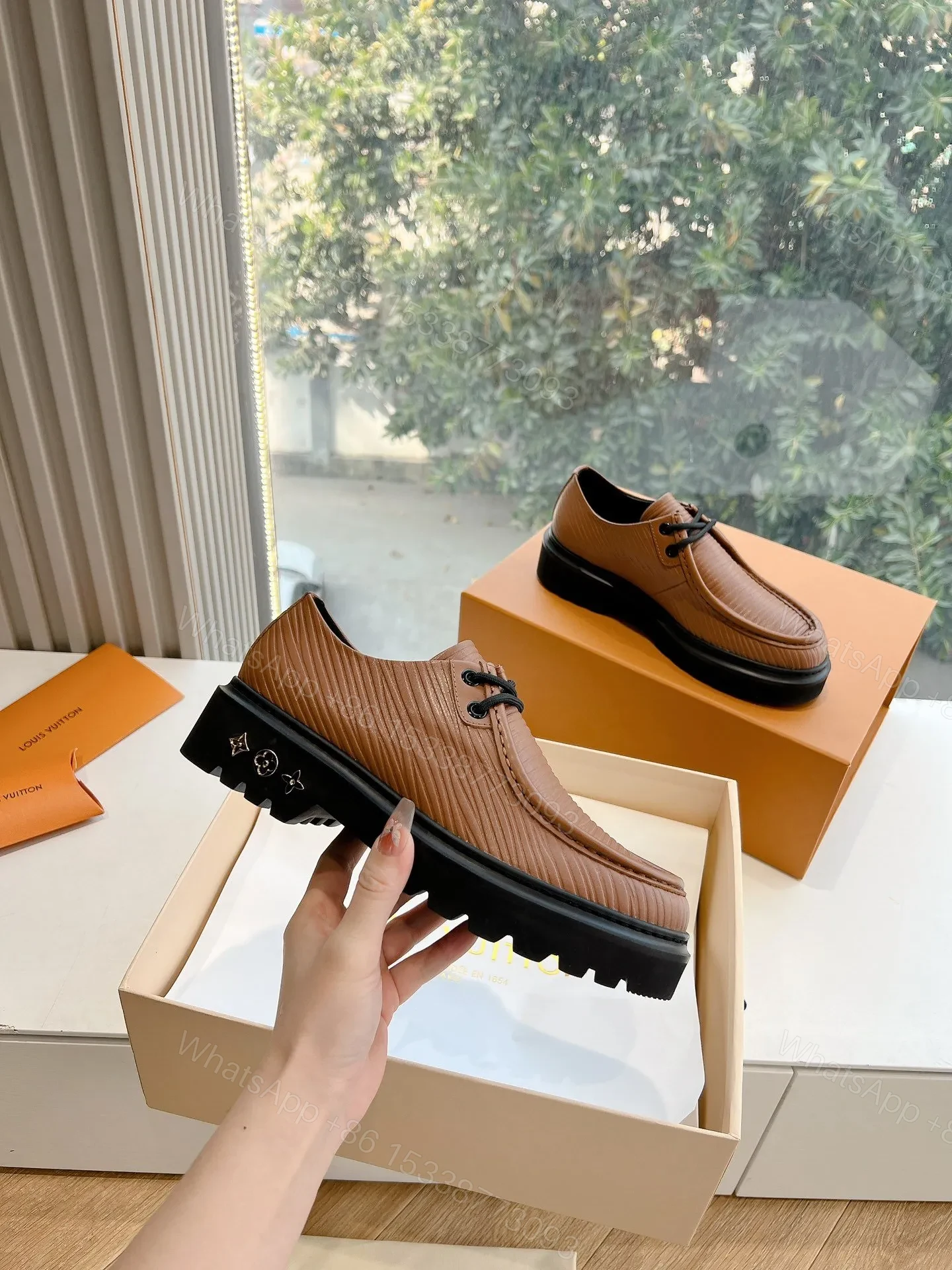 View 3 of LV Women Brown Textured Leather Loafers