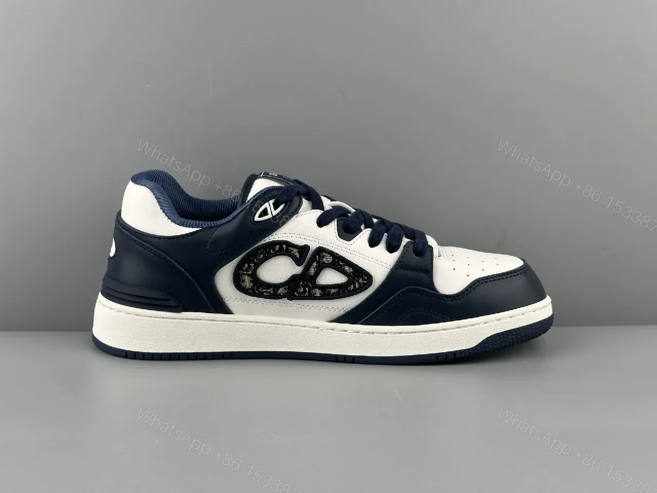 View 4 of Navy Leather High-Top Sneaker with Cutout Detailing