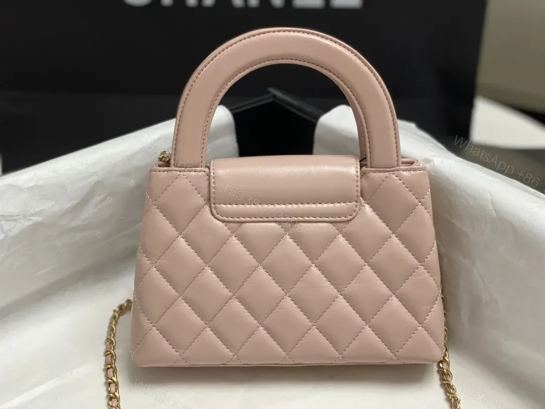View 6 of Soft Pink Quilted Mini Bag with Gold Chain Handle - Everyday Luxe