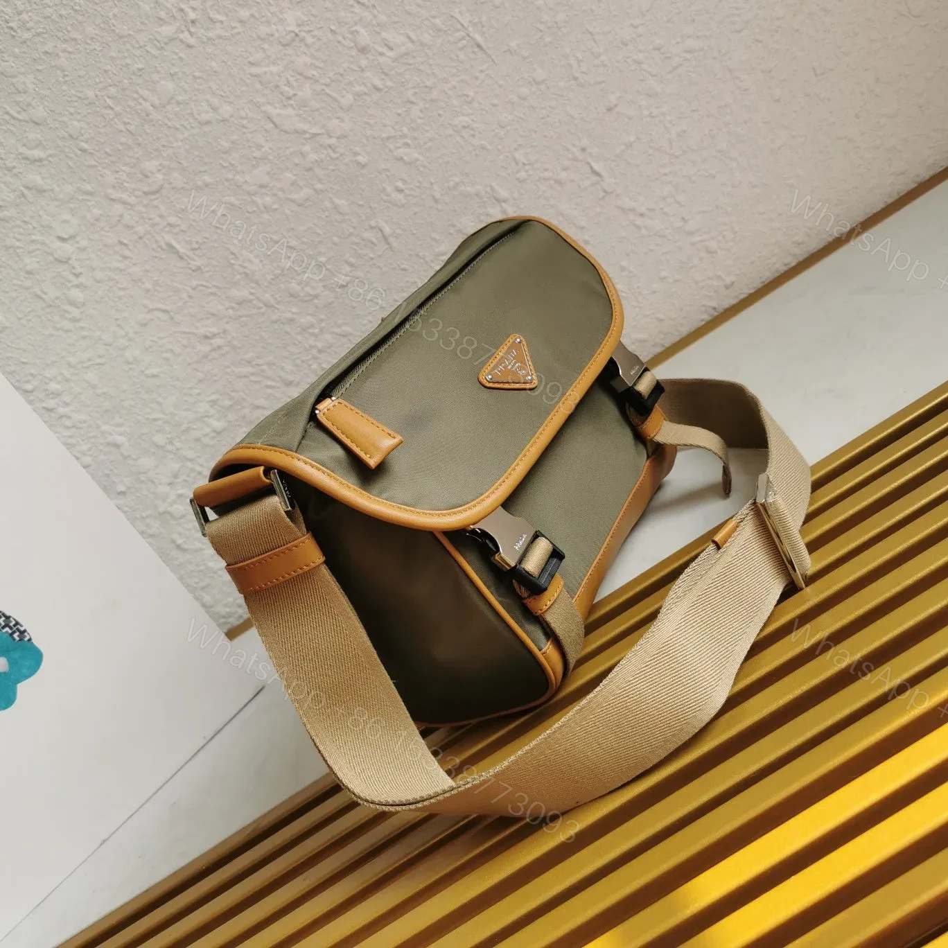 View 2 of MESSENGER BAG 20 IN KHAKI GREEN RE-NYLON AND BROWN CALFSKIN TRIM