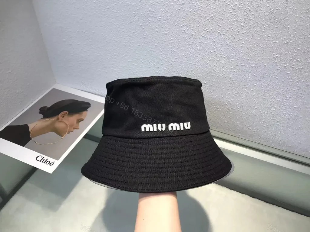 View 7 of Crisp White Miu Miu Bucket Hat: Iconic Logo Shield