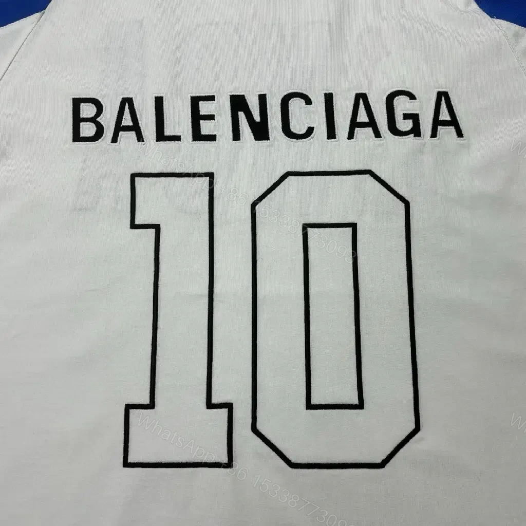 View 7 of Bold Black-White Statement Jersey Tee with Electric Blue Accents