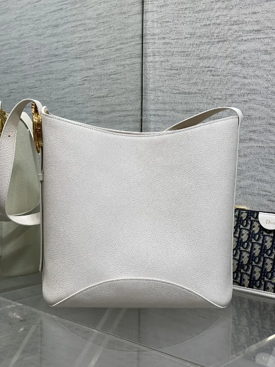 View 2 of White Pebbled Leather Crescent Bag with Navy Dior Wallet Set