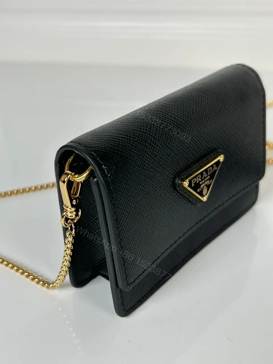 View 10 of Compact Crossbody Bag: Black Leather, Gold Chain, Minimalist Luxe
