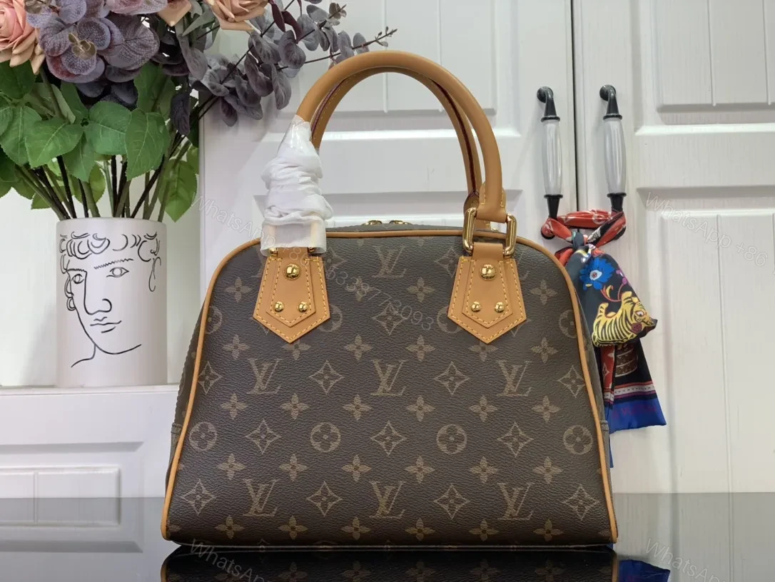 View 2 of Structured Luxury Monogram Handbag with Gold Hardware and Leather Trim