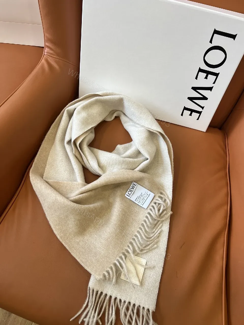 View 9 of Neutral Wool-Blend Scarf: Subtle Pattern, Elegant Fringe