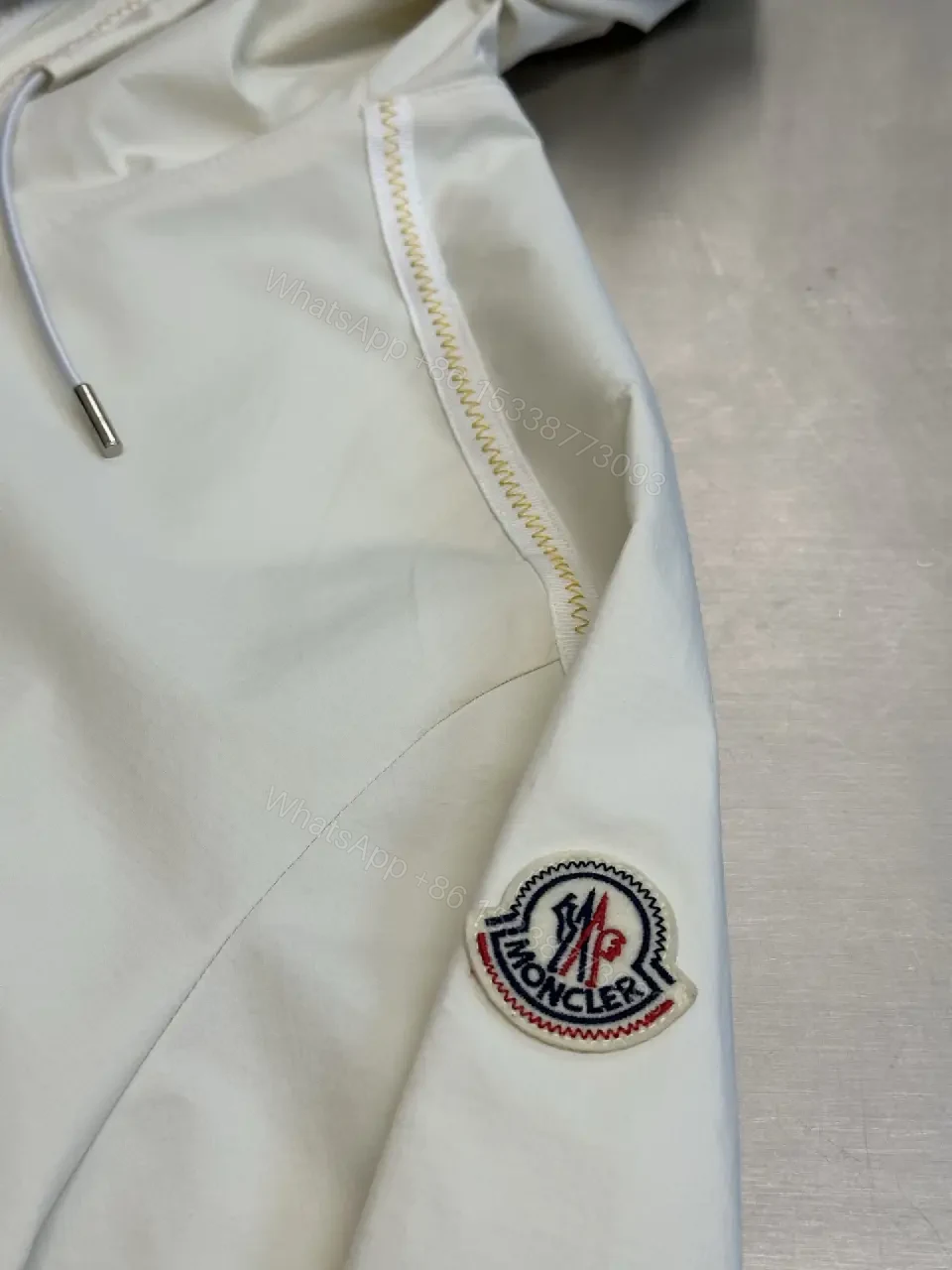 View 2 of Cream nylon lightweight hooded jacket with premium comfort for everyday luxury