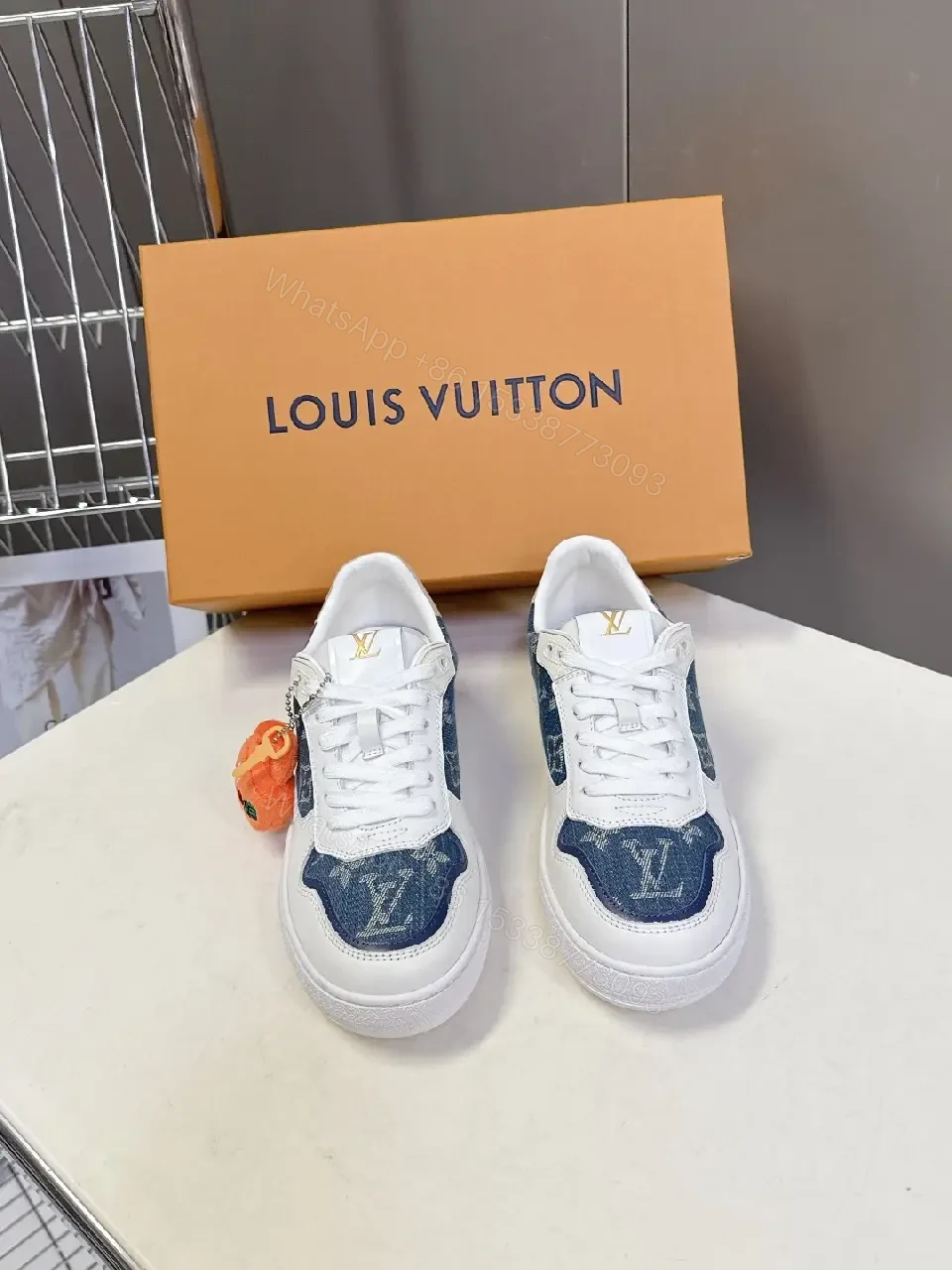 Denim-Accent Luxury Sneakers with LV Flair — view 1
