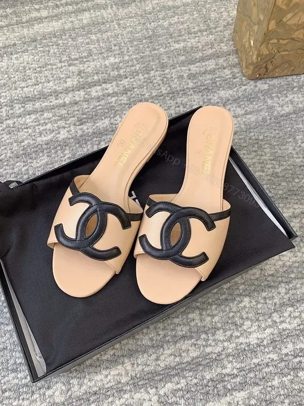 Tan Leather Slip-Ons with Logo Detail – Everyday Luxe Sandals — view 1