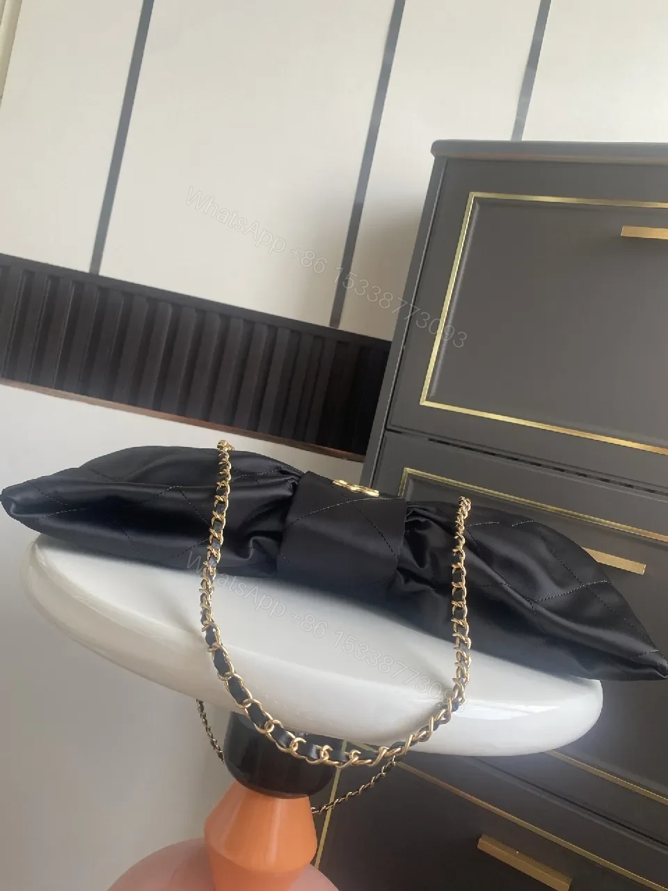 View 5 of Quilted Black Bag with Gold Emblem - Luxury Everyday Style