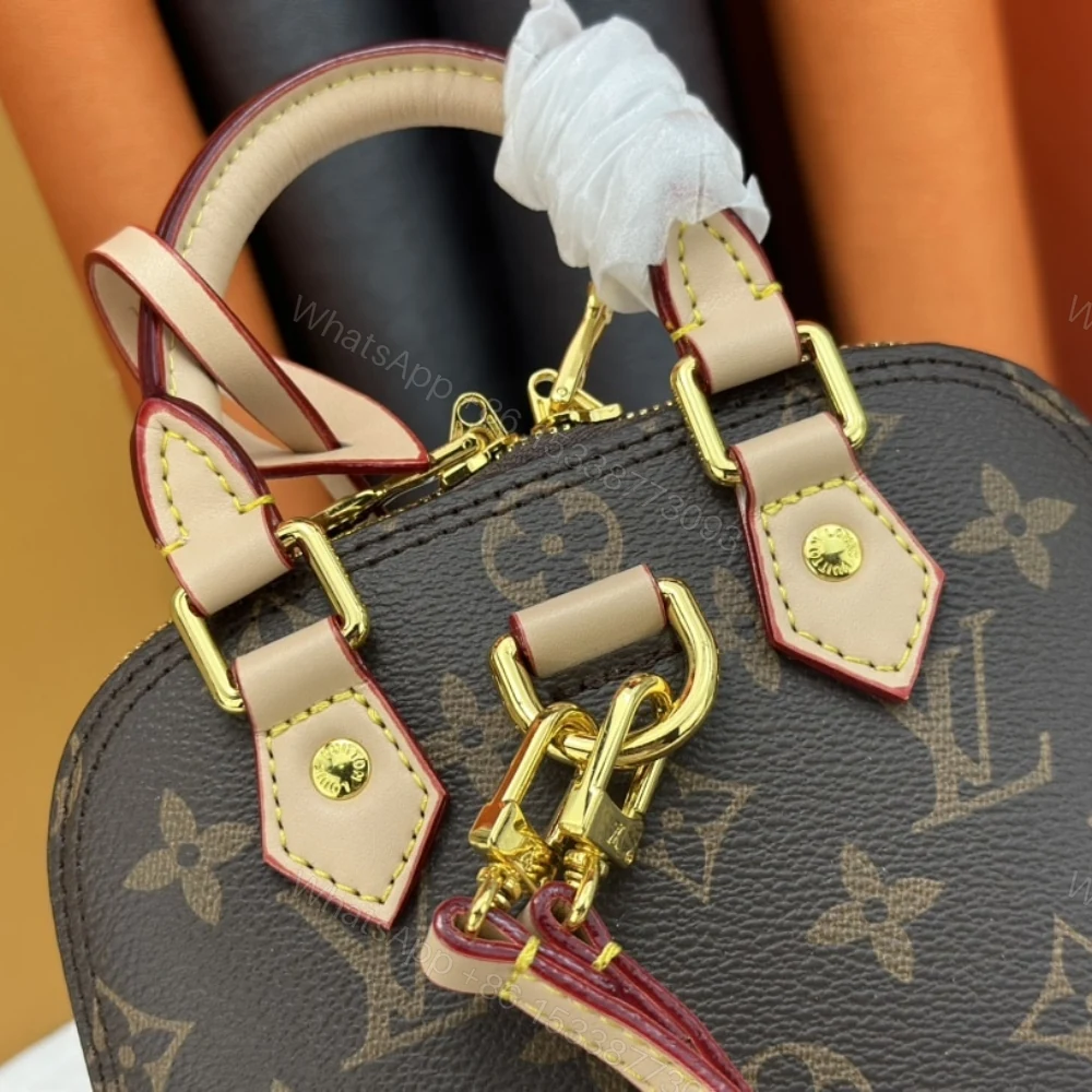 View 6 of Louis Vuitton Alma Backpack Monogram Canvas Brown 20Cm M47132