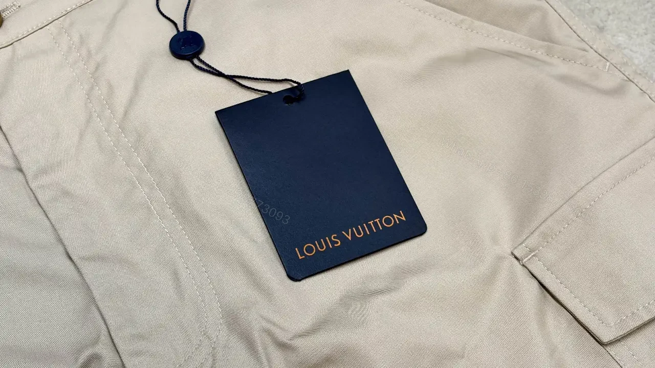 View 6 of Beige Nylon Cargo Shorts with Louis Vuitton Tag