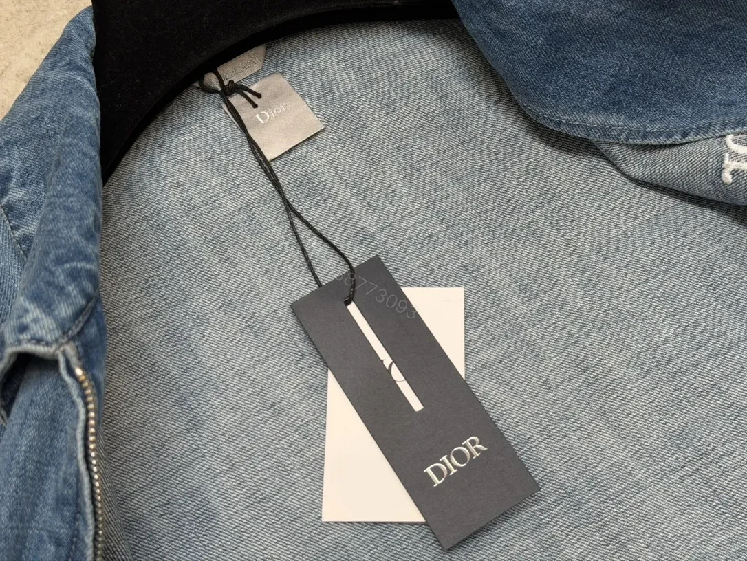View 7 of Medium Denim Zip-Up Jacket - Subtle Logo, Modern Texture