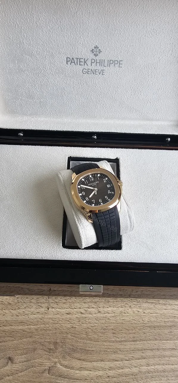 View 4 of Patek Philippe Aquanaut Rose gold with box and papers