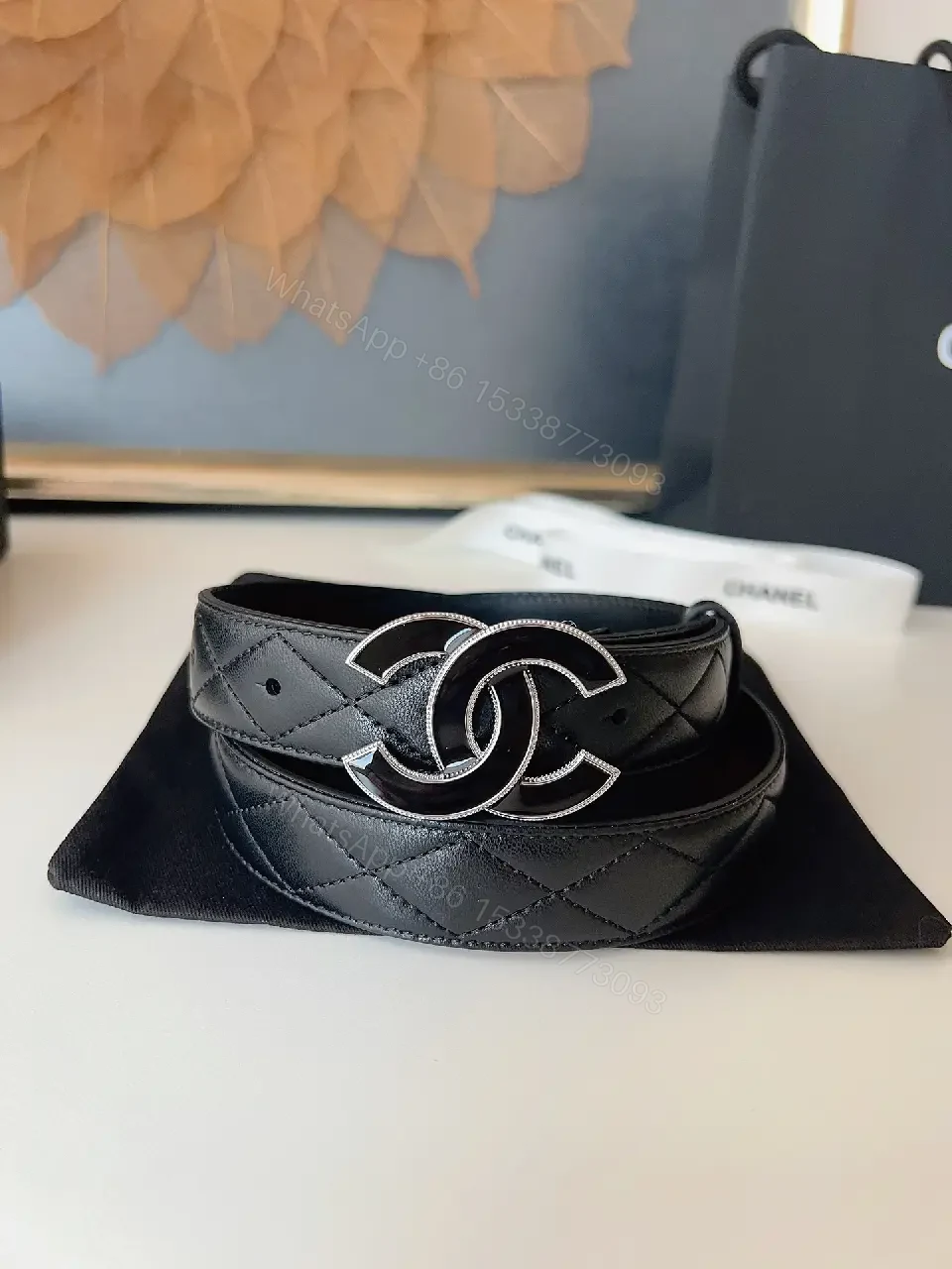 View 2 of Quilted Leather Belt with Signature Buckle - Black - Slim
