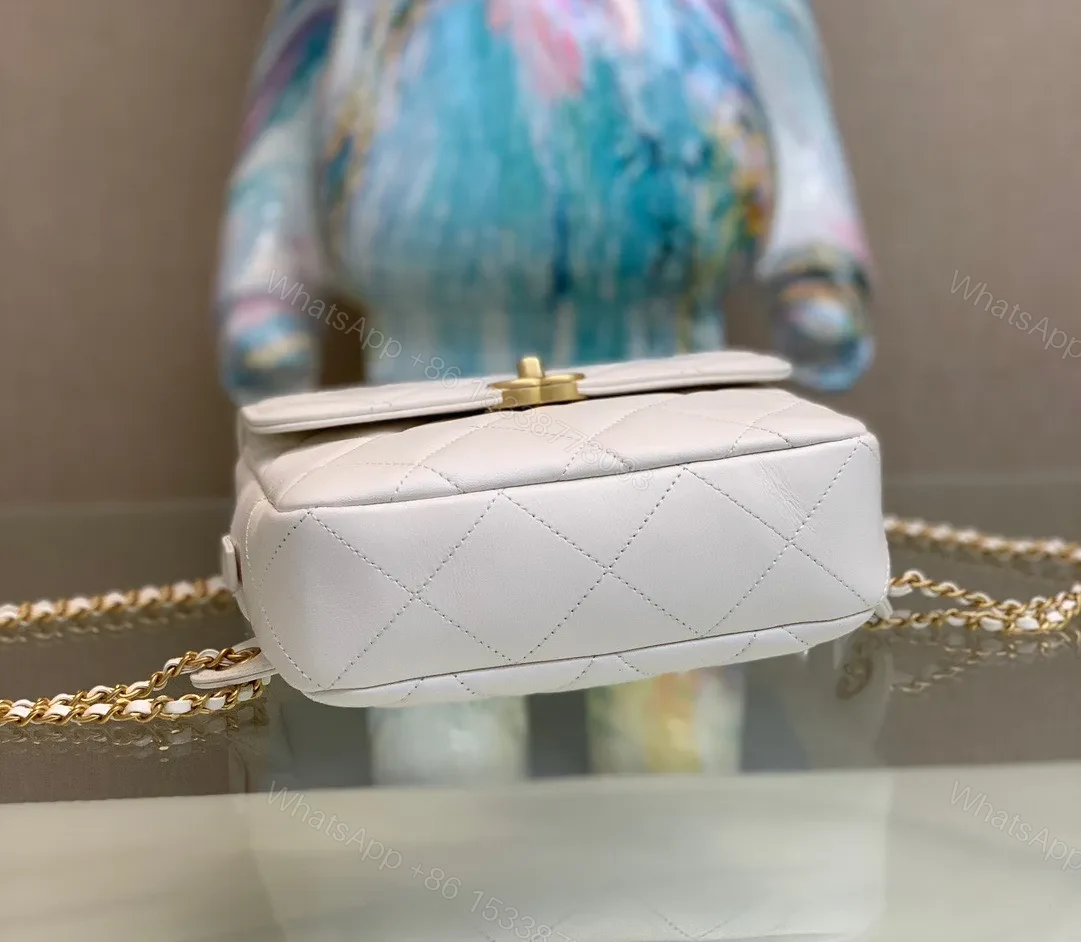 View 2 of Chanel Mini Backpack Replica 11 Milk White With Gold Lock 18x20x11.5cm