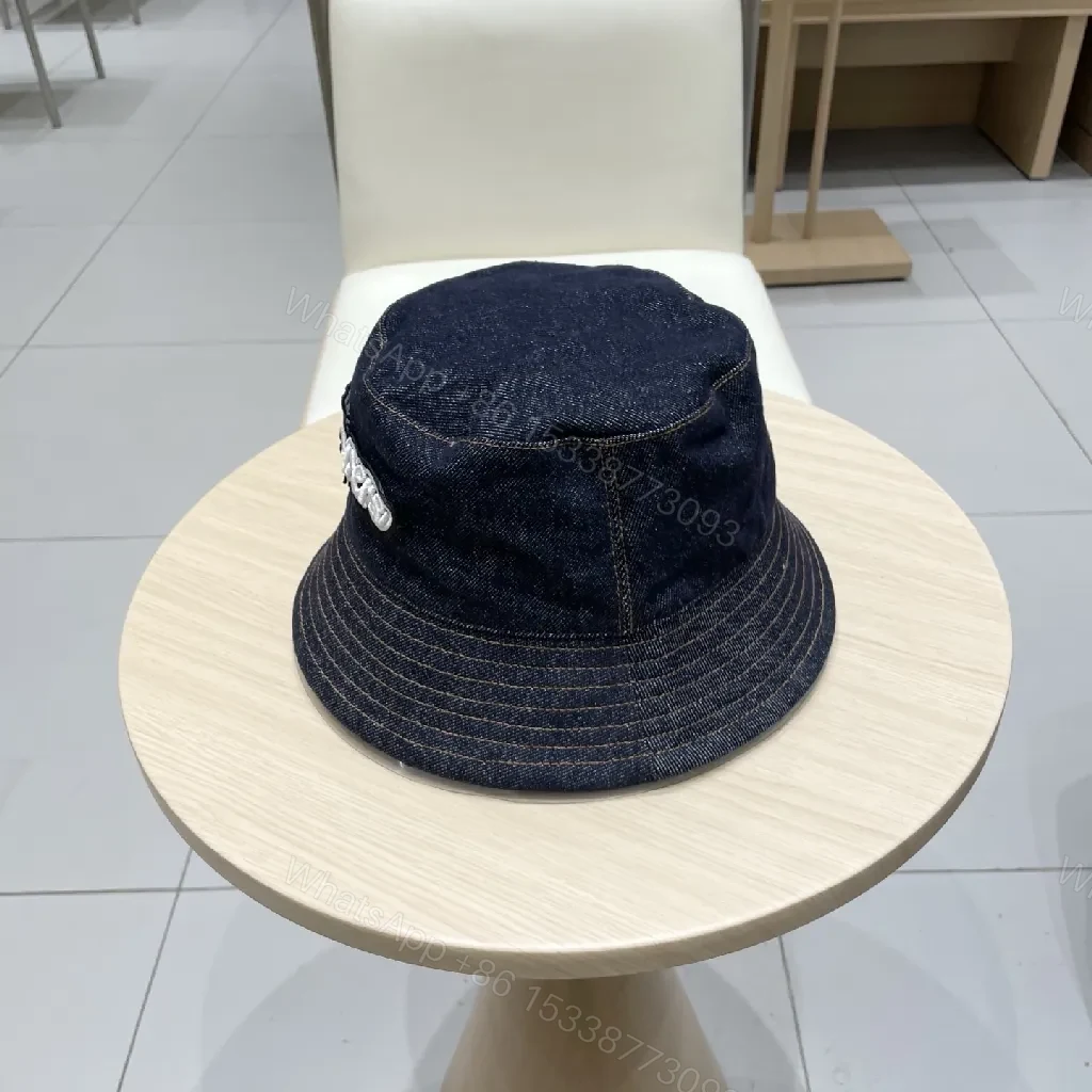 View 3 of Denim Bucket Hat + Embroidered Logo + Streetwear Chic + Luxury Detail + Hat