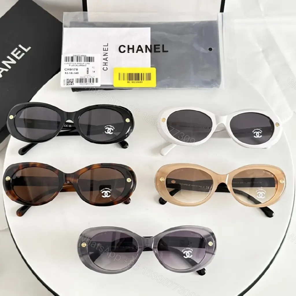 View 8 of Lux Black Round Sunglasses with Gold Hardware, Oversized UV Protection